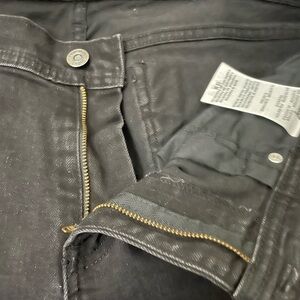 Levi’s. Black, size 8